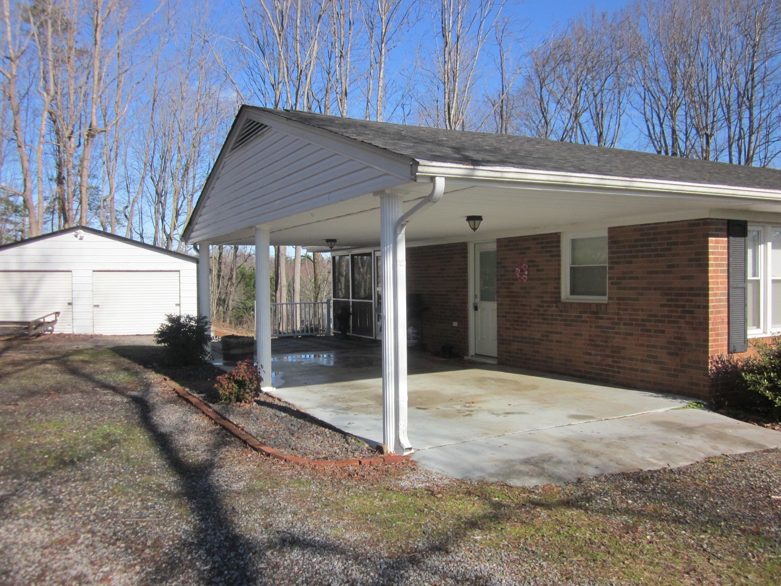 77 Pony Ridge Road Bassett, VA 24055 - Photo 74 of 84 a backyard of a house with table and chairs