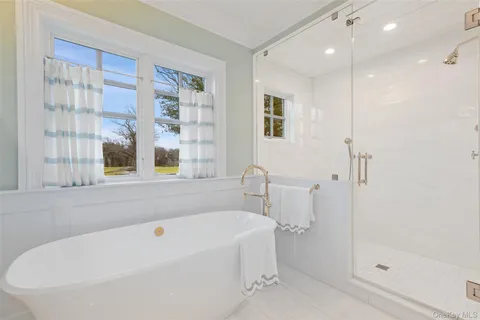 a room with furniture and a chandelier