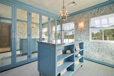 a bedroom with bed and window