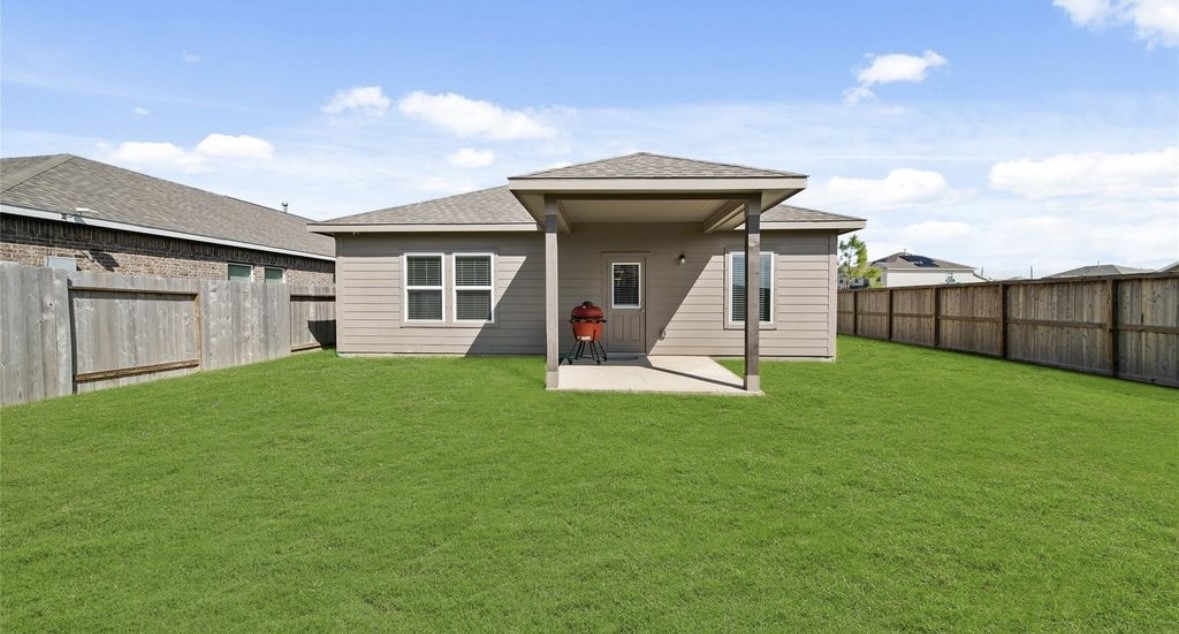 1326 Ponderosa Pne Drive Rosharon, TX 77583 - Photo 14 of 14 a view of a backyard with a garden and entertaining space