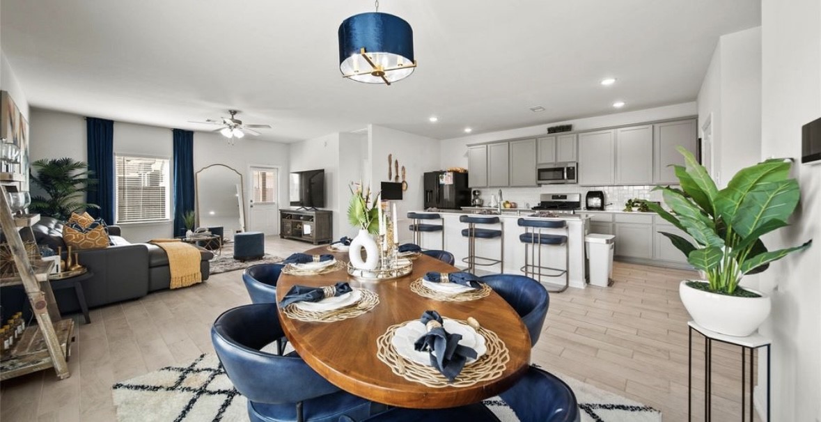 1326 Ponderosa Pne Drive Rosharon, TX 77583 - Photo 8 of 14 a living room with lots of furniture kitchen view and a chandelier