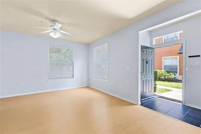 a view of an empty room with a window