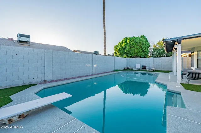 a front view of a house with a garage