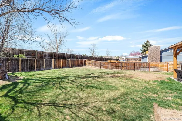 a view of a house with a big yard
