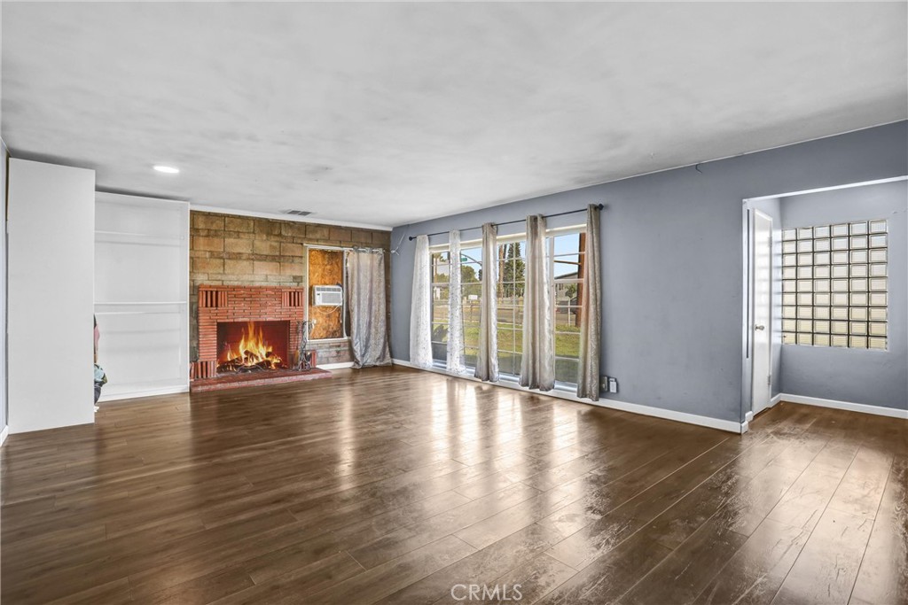 4539 Maine Avenue Baldwin Park, CA 91706 - Photo 6 of 48 view 2 for Living room #1 w/ fireplace in the main house