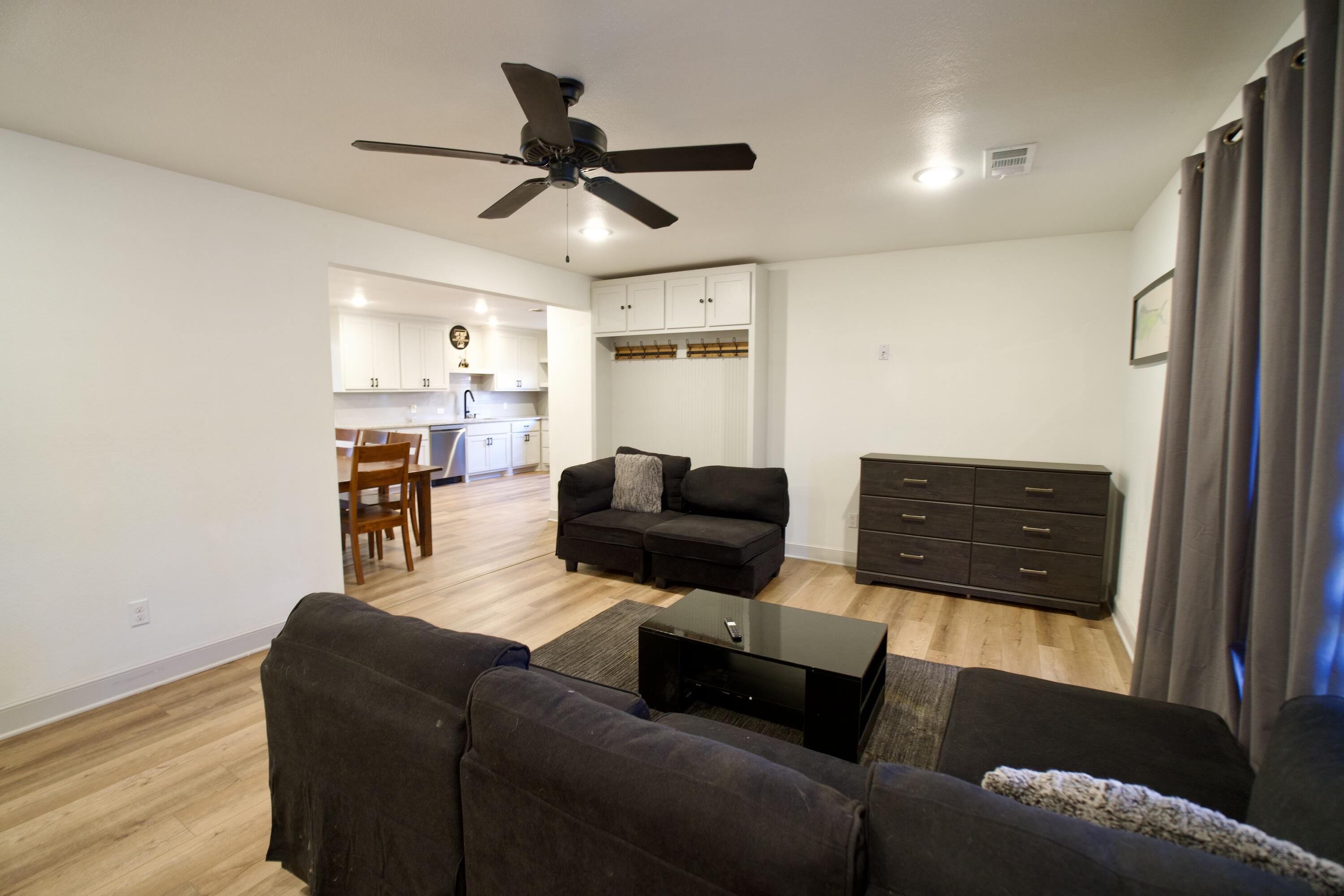 2517 52nd Street Lubbock, TX 79413 - Photo 4 of 17 a living room with furniture and a flat screen tv