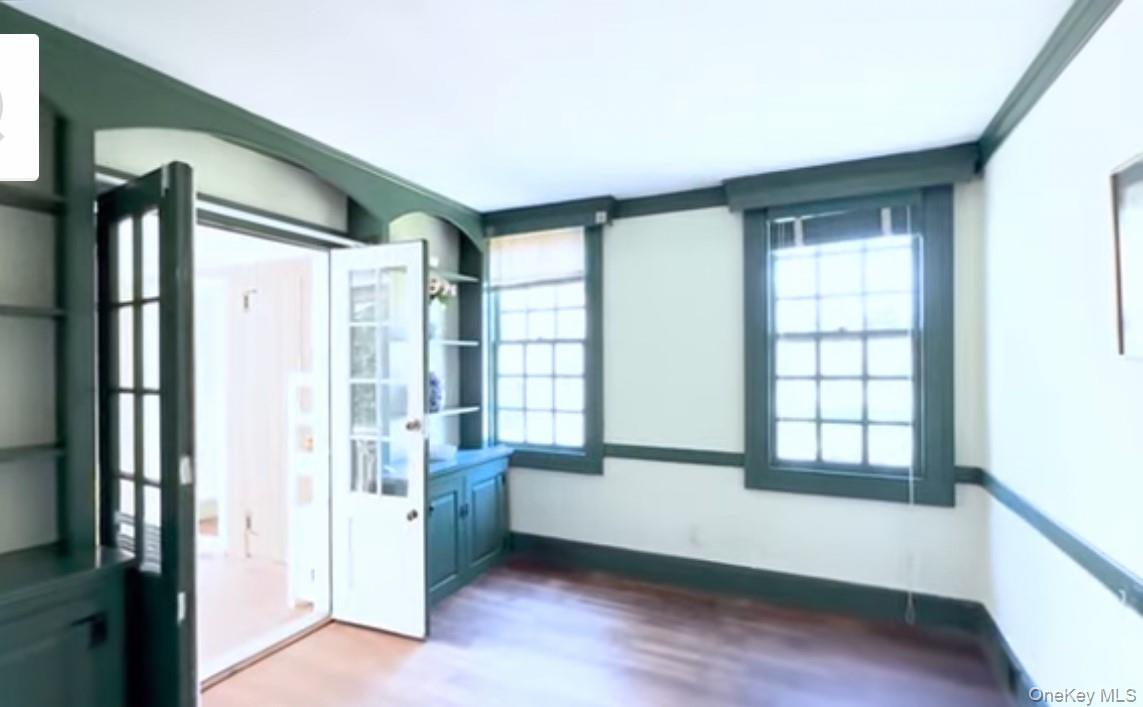 24 Hawkins Road Stony Brook, NY 11790 - Photo 11 of 45 a view of an empty room with a window