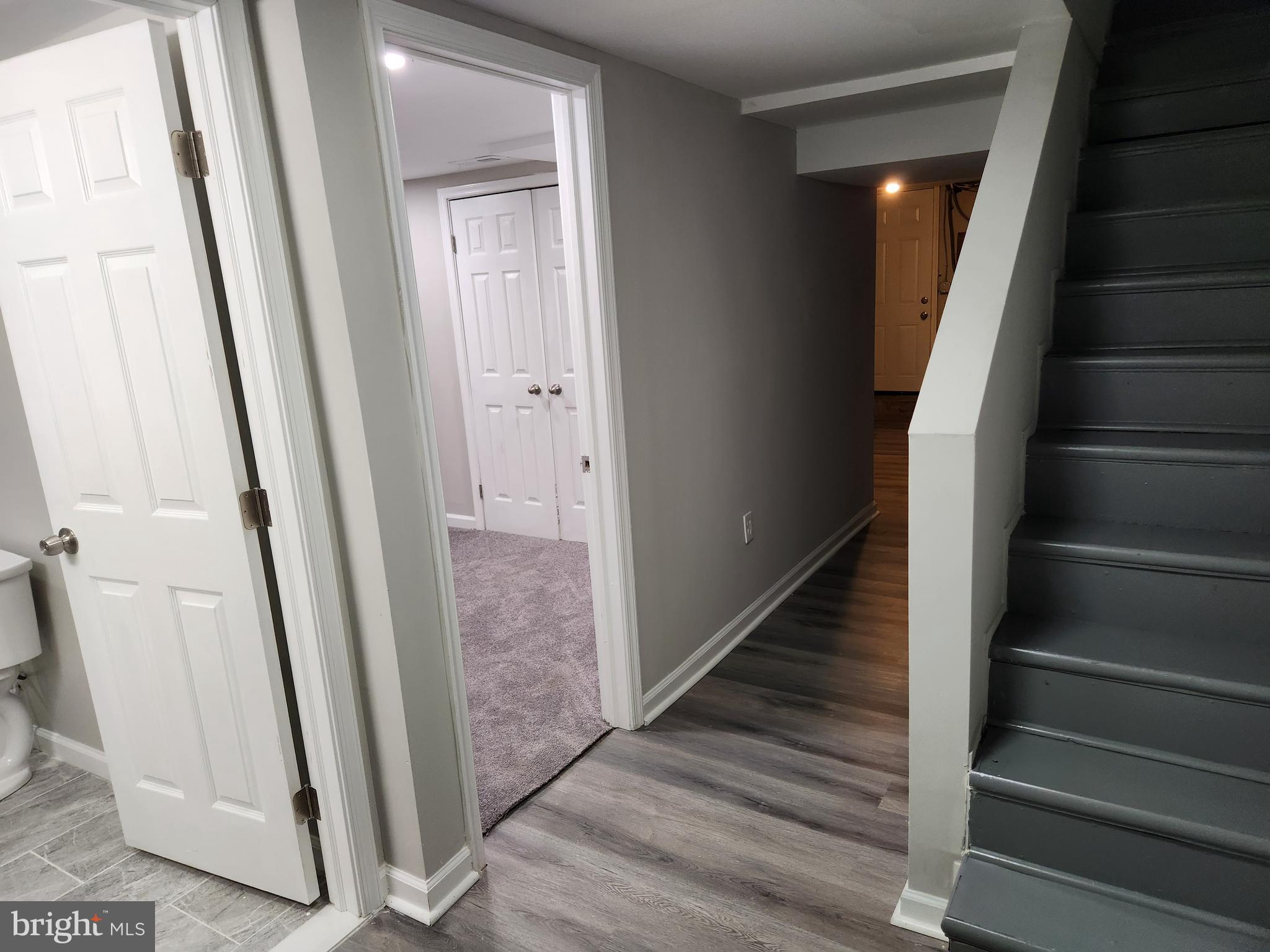 4113 Century Road Baltimore, MD 21206 - Photo 17 of 27 a view of entryway with wooden floor and stairs