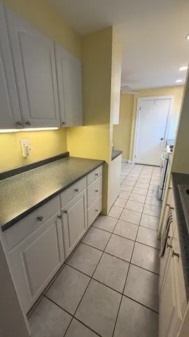 a bathroom with a sink a vanity and a mirror