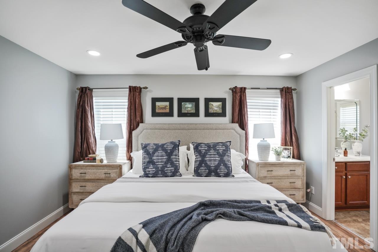 47 Hadleigh Way Fuquay-Varina, NC 27526 - Photo 15 of 37 a bedroom with a bed and window