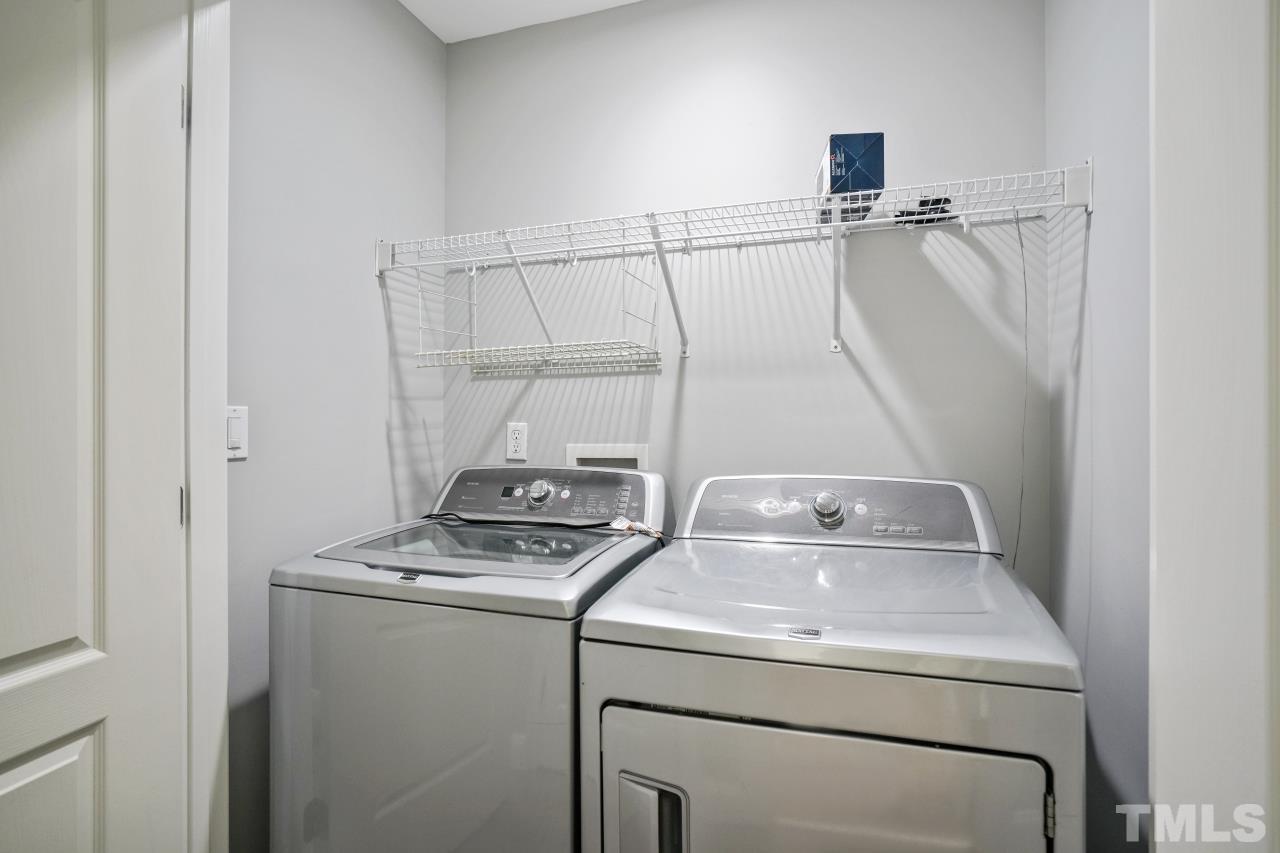 47 Hadleigh Way Fuquay-Varina, NC 27526 - Photo 23 of 37 a utility room with dryer and washer