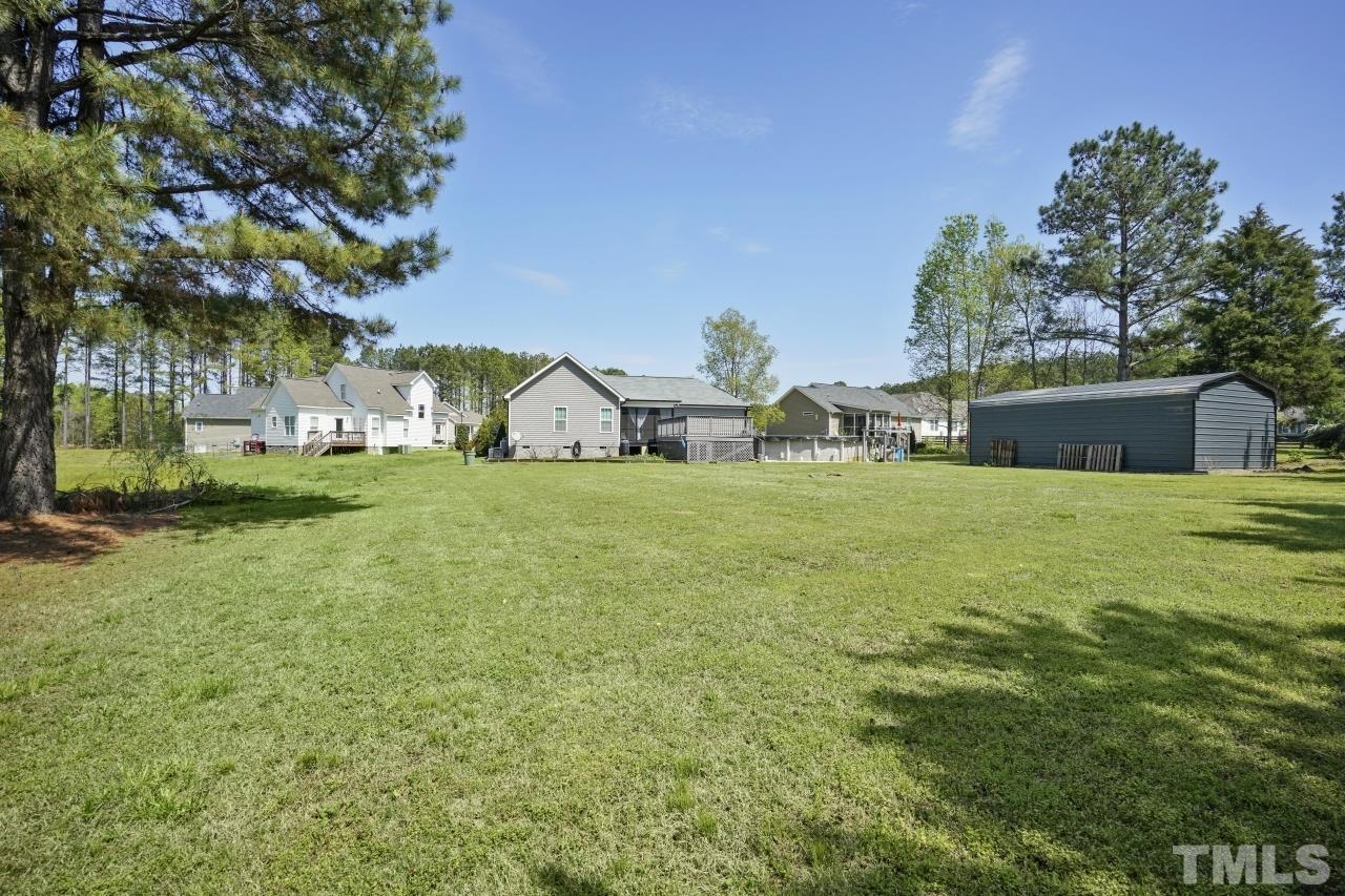 47 Hadleigh Way Fuquay-Varina, NC 27526 - Photo 32 of 37 a view of a house with a yard