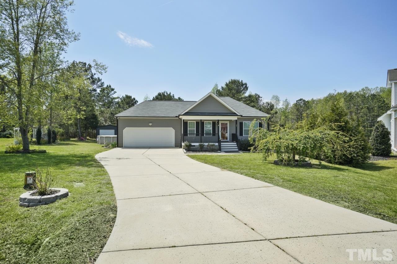 47 Hadleigh Way Fuquay-Varina, NC 27526 - Photo 37 of 37 a front view of a house with garden