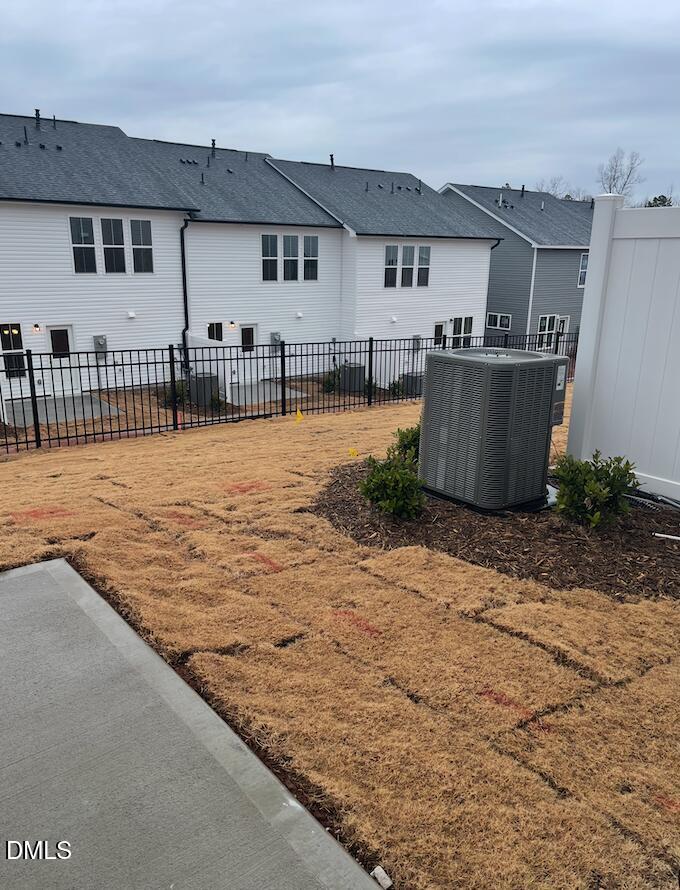 4029 Kidd Place Durham, NC 27703 - Photo 25 of 28 a view of a house with backyard and tree