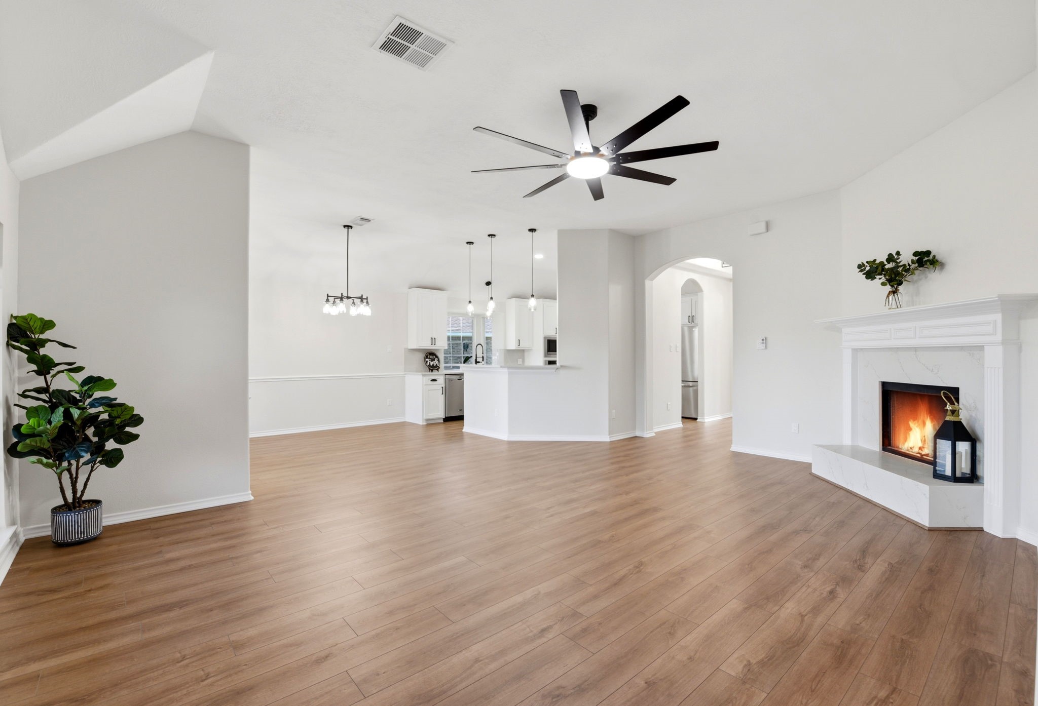 29819 South Legends Village Circle Spring, TX 77386 - Photo 11 of 48 a view of empty room with wooden floor and a fireplace