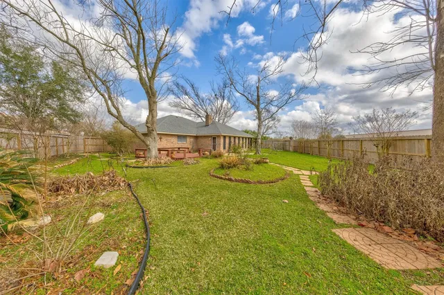 a view of swimming pool with outdoor seating