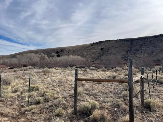 a view of ocean and mountain