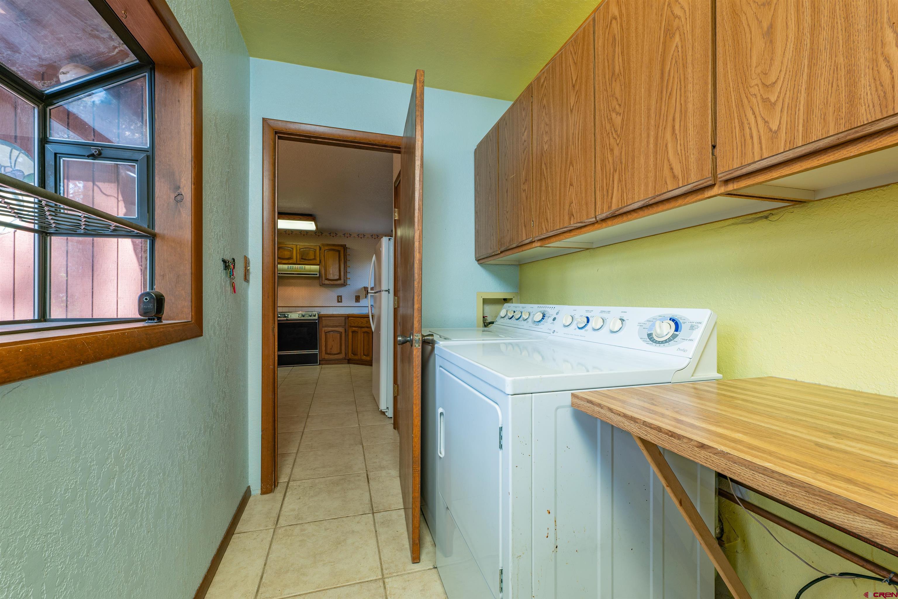 284 Willow Drive Durango, CO 81301 - Photo 11 of 35 a utility room with dryer and washer