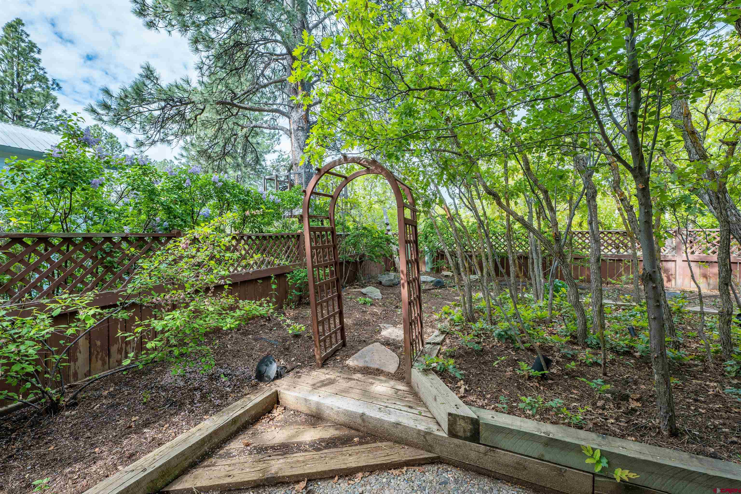 284 Willow Drive Durango, CO 81301 - Photo 13 of 35 a backyard of a house with lots of green space