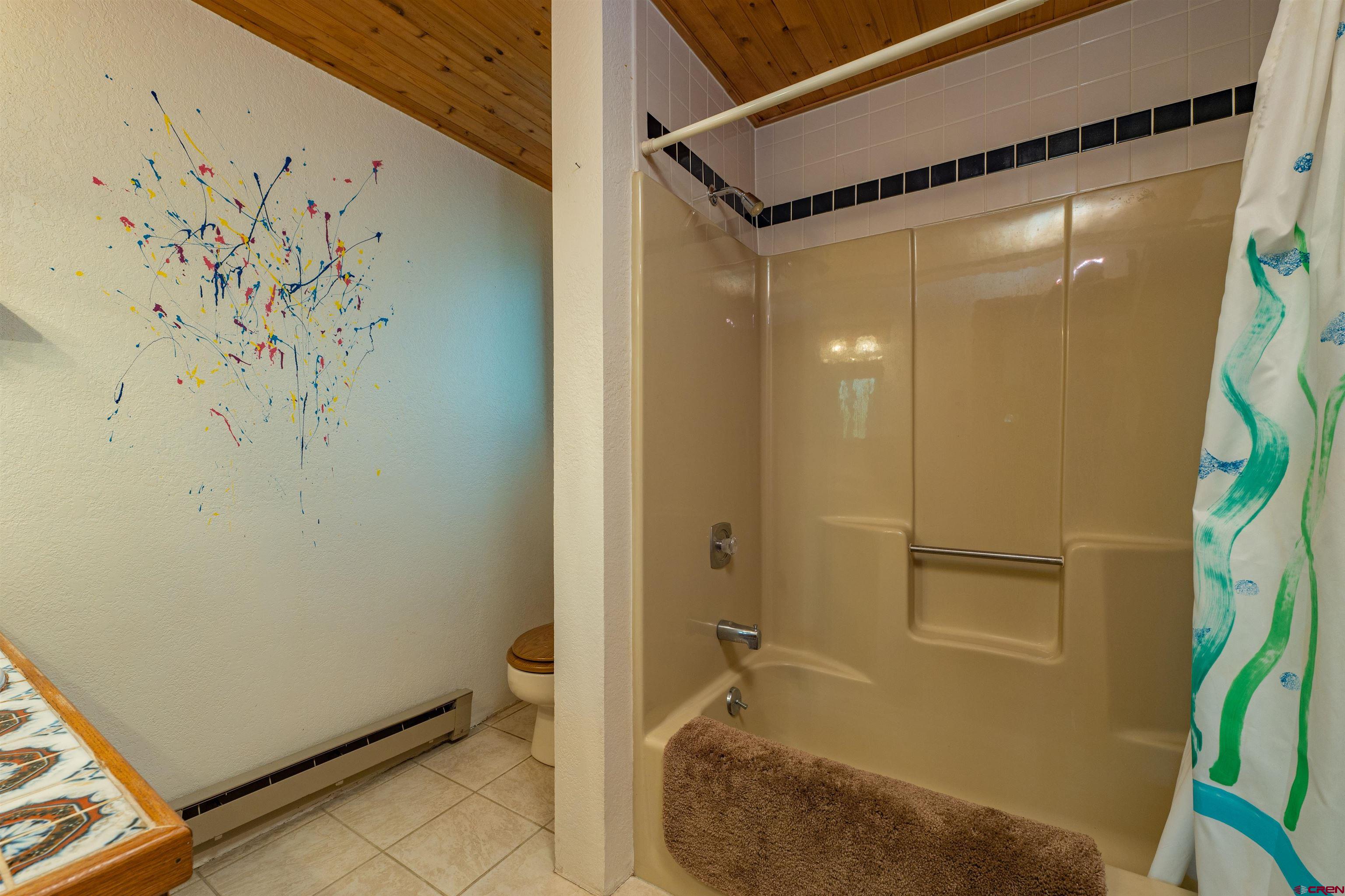 284 Willow Drive Durango, CO 81301 - Photo 23 of 35 a bathroom with a shower and a sink