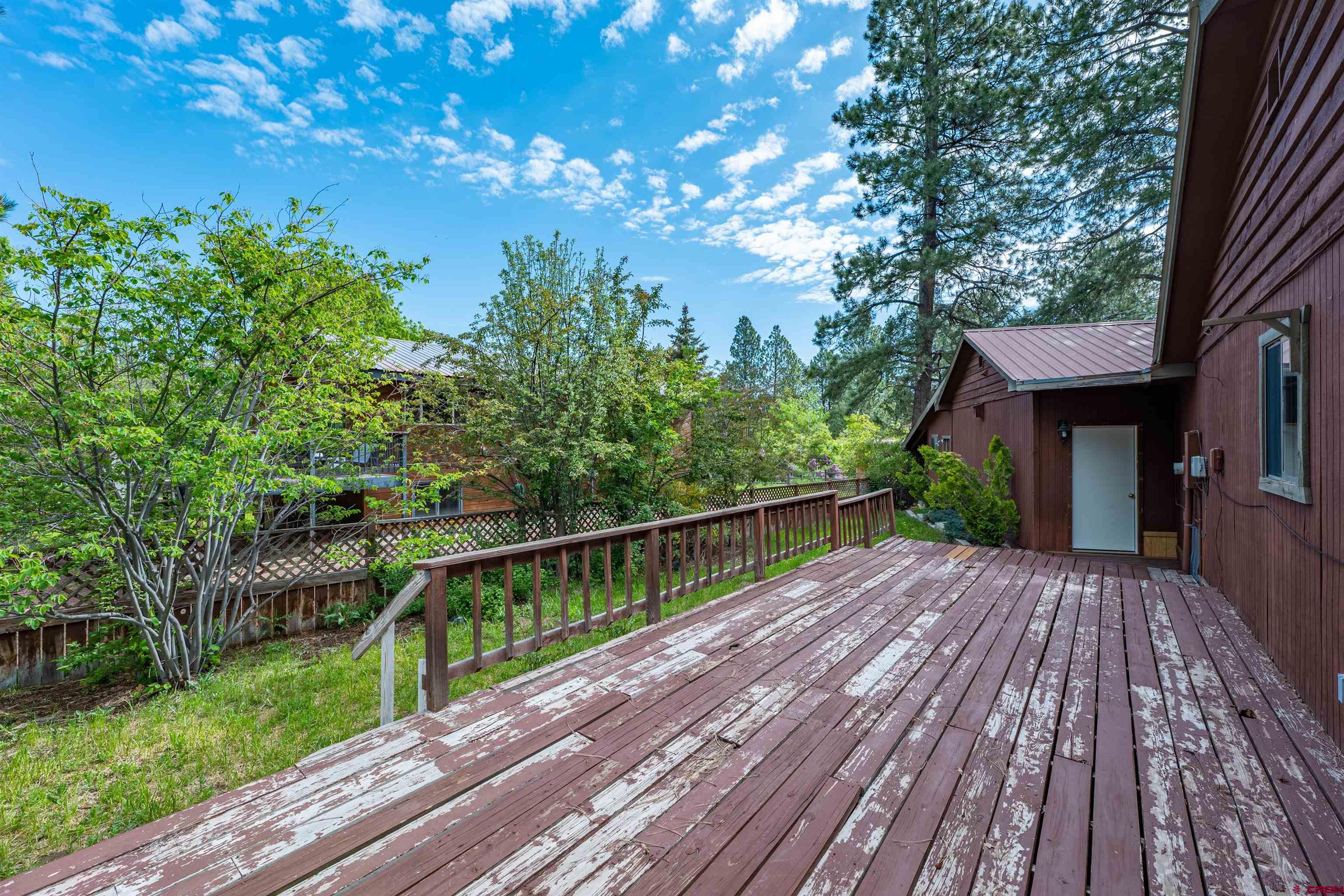 284 Willow Drive Durango, CO 81301 - Photo 30 of 35 a view of balcony with wooden floor and fence