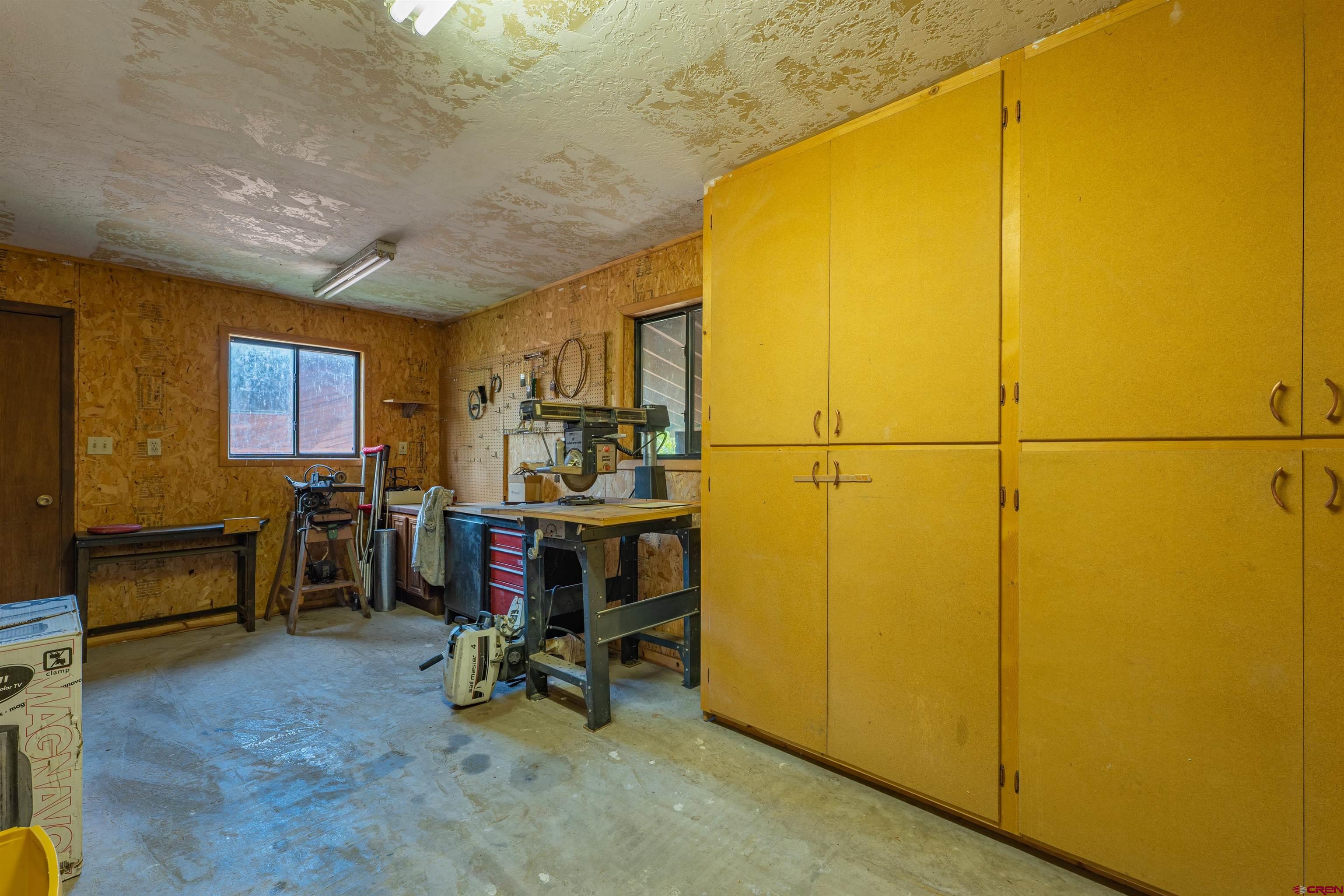 284 Willow Drive Durango, CO 81301 - Photo 31 of 35 a view of a workspace with furniture and a window