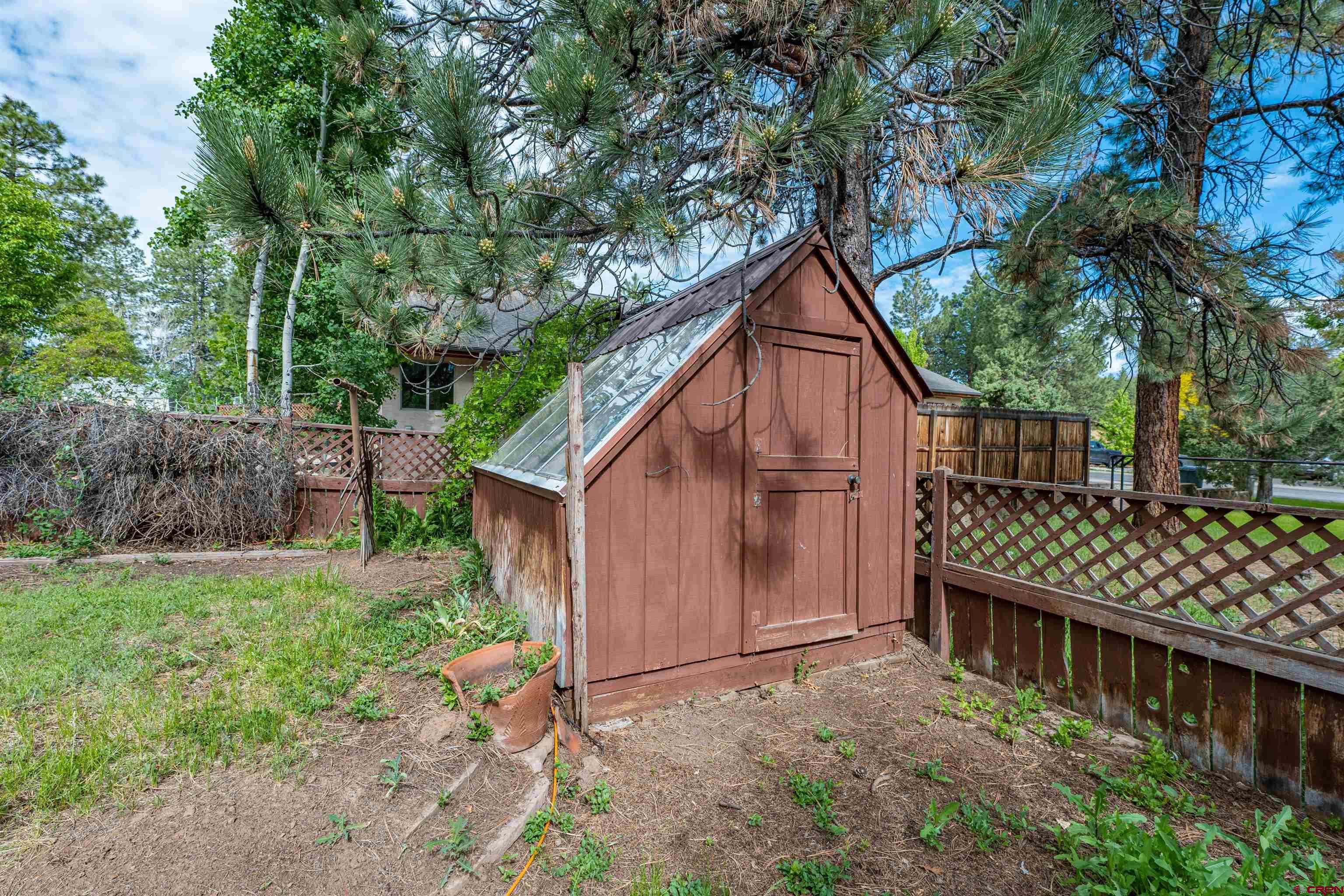 284 Willow Drive Durango, CO 81301 - Photo 34 of 35 a view of backyard with green space and trees