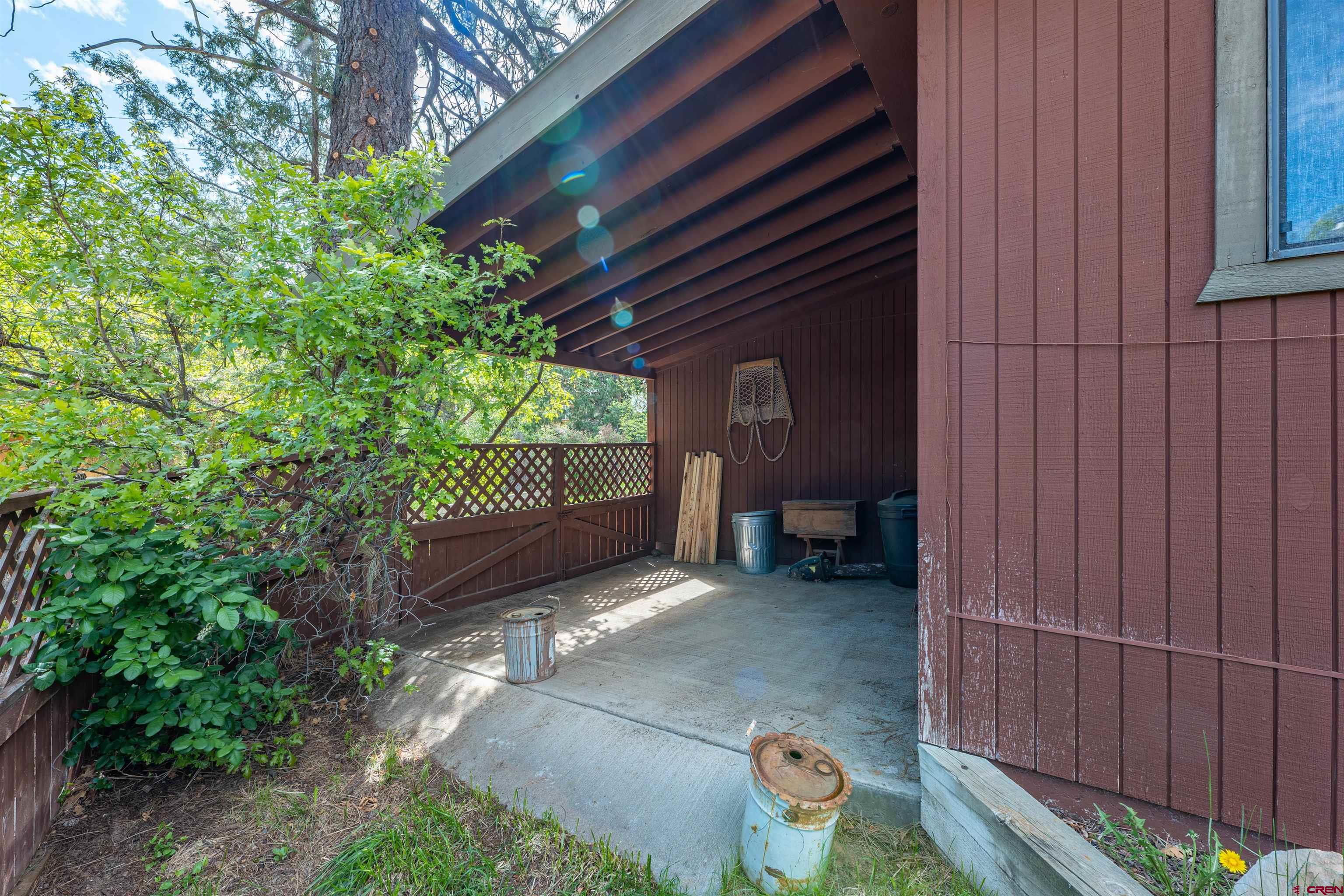 284 Willow Drive Durango, CO 81301 - Photo 10 of 35 a view of a porch with garden and patio