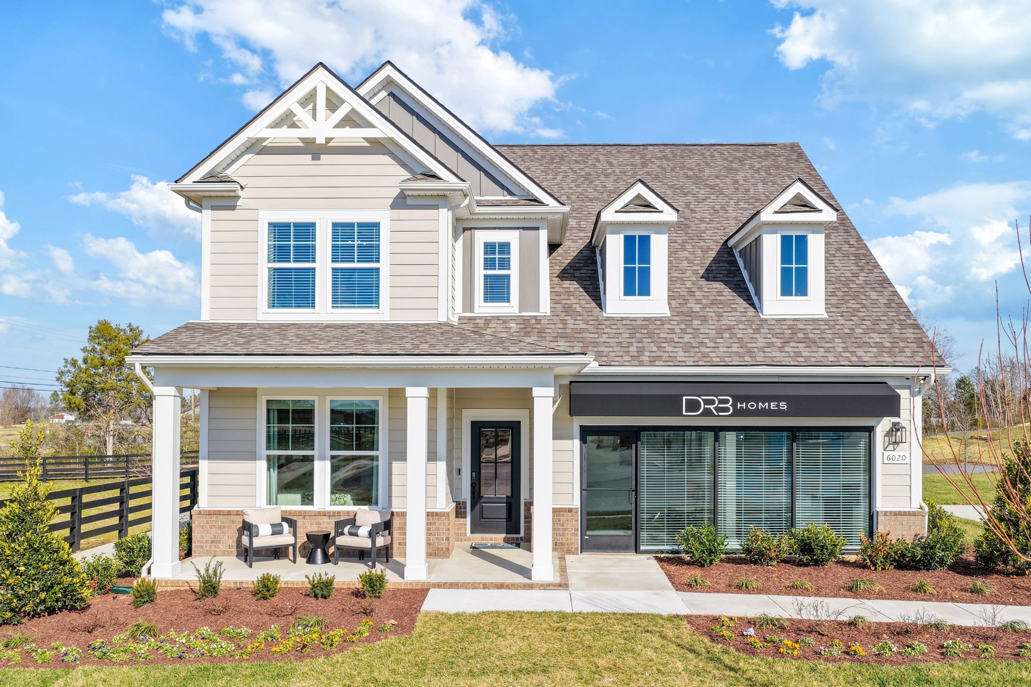 6019 Bloom Street Rockvale, TN 37153 - Photo 1 of 45 a front view of a house with a yard outdoor seating and garage