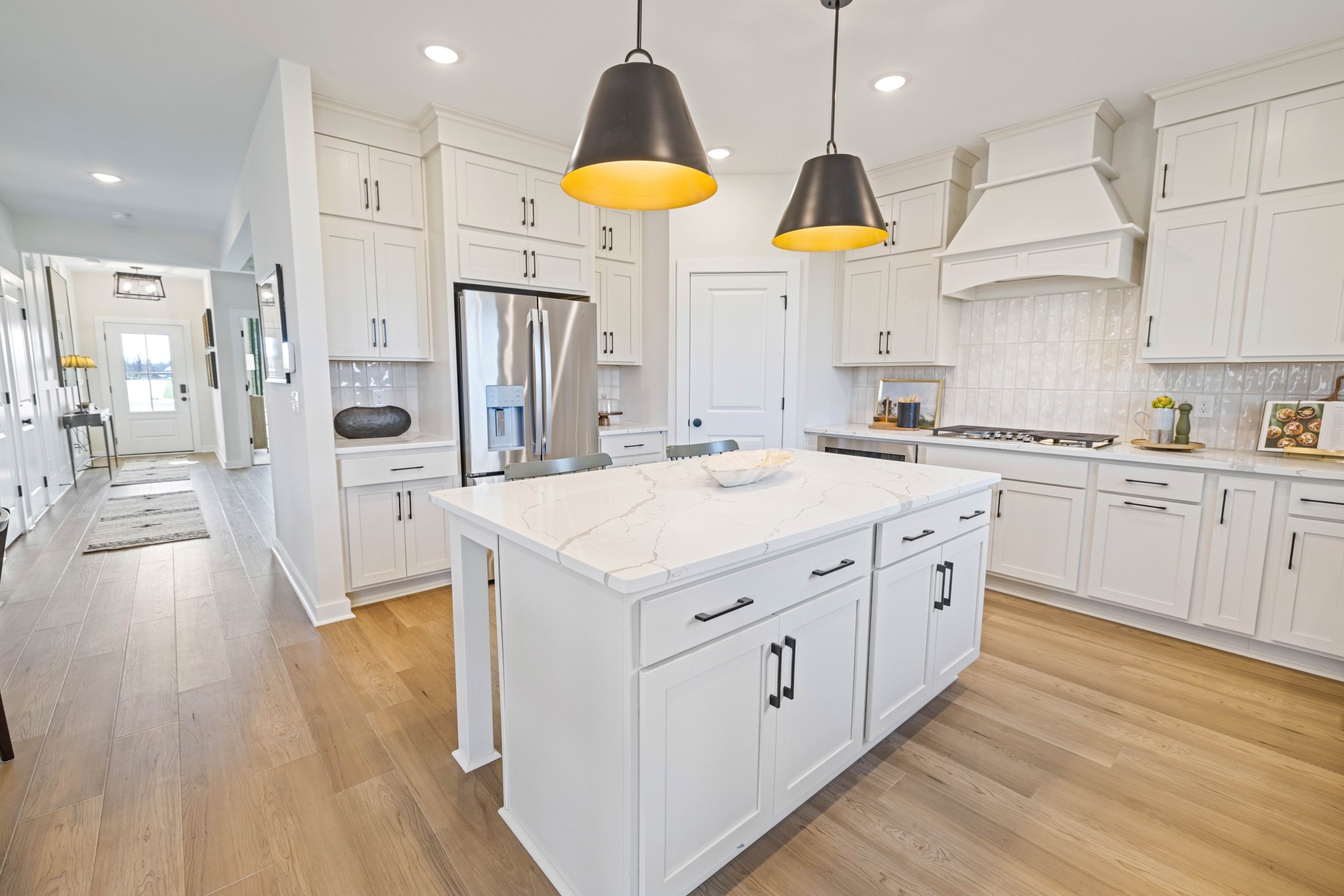 6019 Bloom Street Rockvale, TN 37153 - Photo 17 of 45 a kitchen with stainless steel appliances granite countertop a sink stove and refrigerator