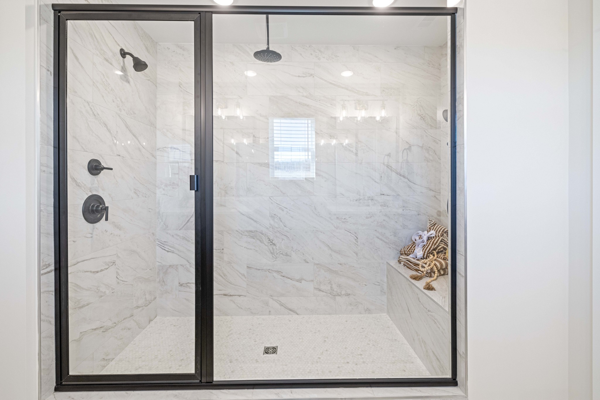 6019 Bloom Street Rockvale, TN 37153 - Photo 45 of 45 a bathroom with a glass shower door