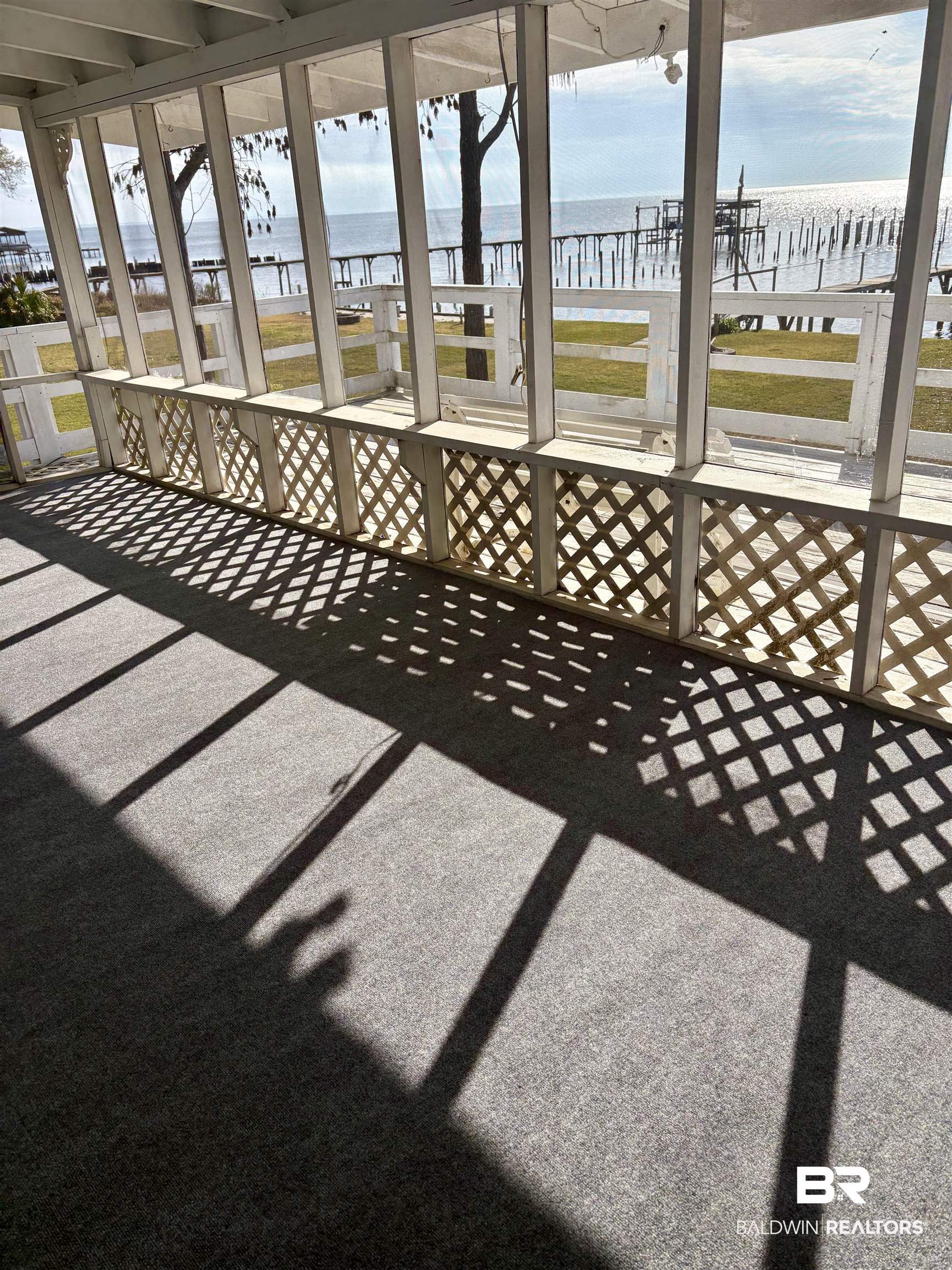 8959 Shore Drive Foley, AL 36535 - Photo 18 of 53 New carpet on Screened in Porch