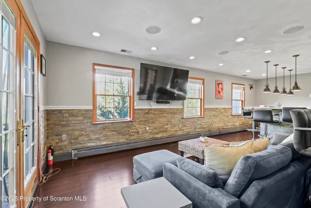 a spacious bathroom with a bathtub and a window