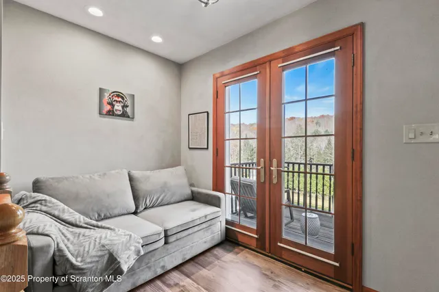 a view of a chair and table in the balcony