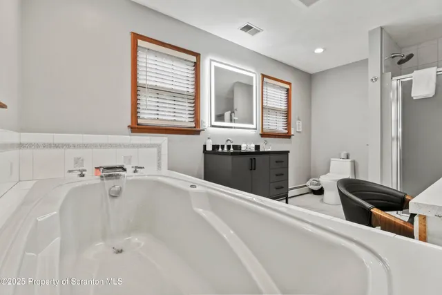 a view of a chairs and table in patio