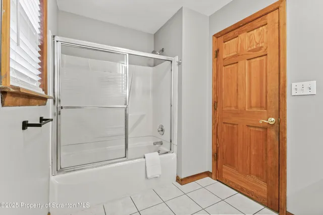 a view of a chairs and table in the patio
