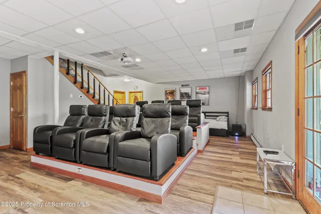 a view of a chairs and table in patio