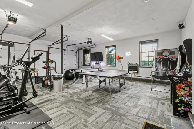 a view of a house with backyard and porch