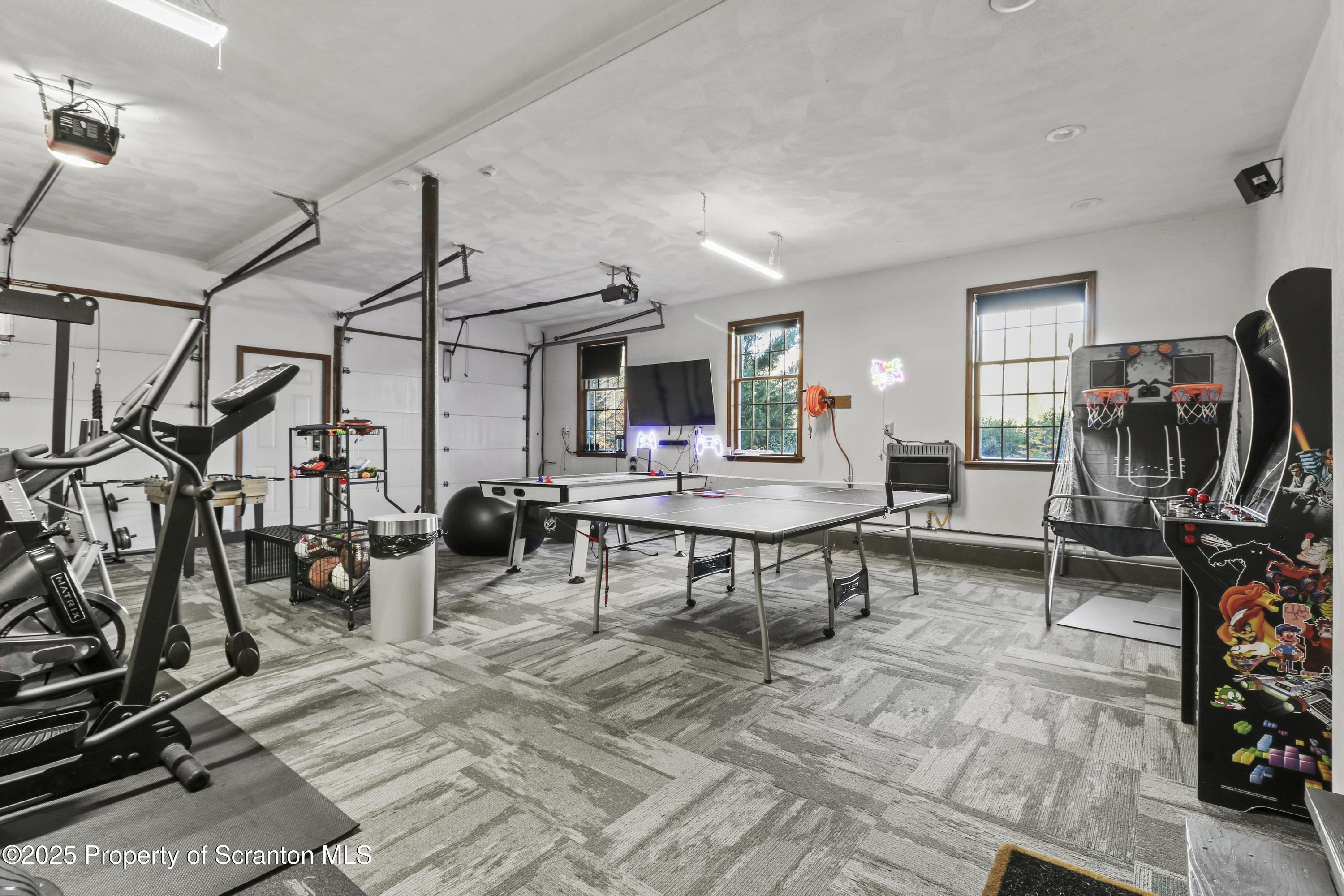 1509 Creek Road New Milford, PA 18834 - Photo 39 of 64 a view of a room with gym equipment