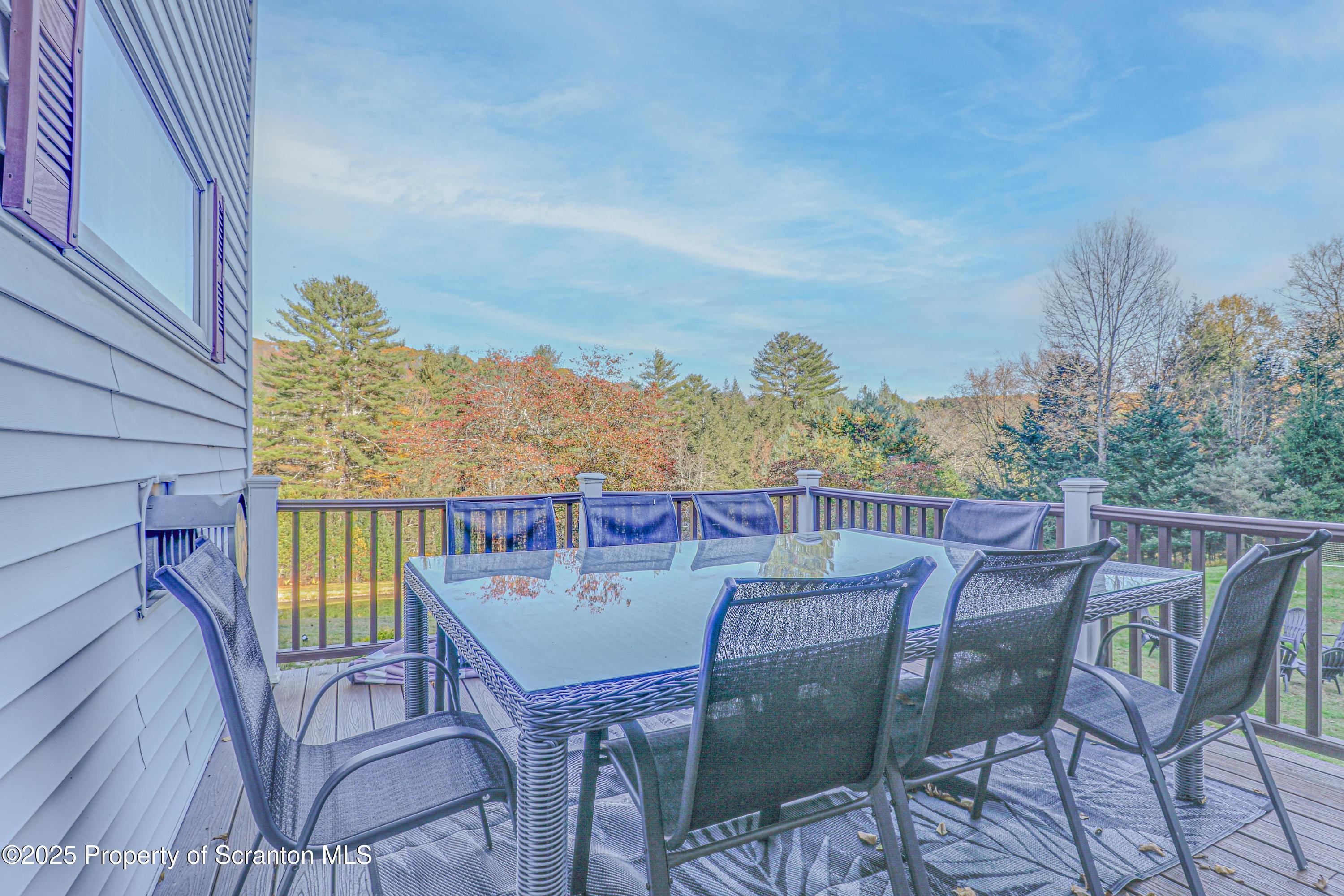 1509 Creek Road New Milford, PA 18834 - Photo 45 of 64 a view of a chairs and table in patio