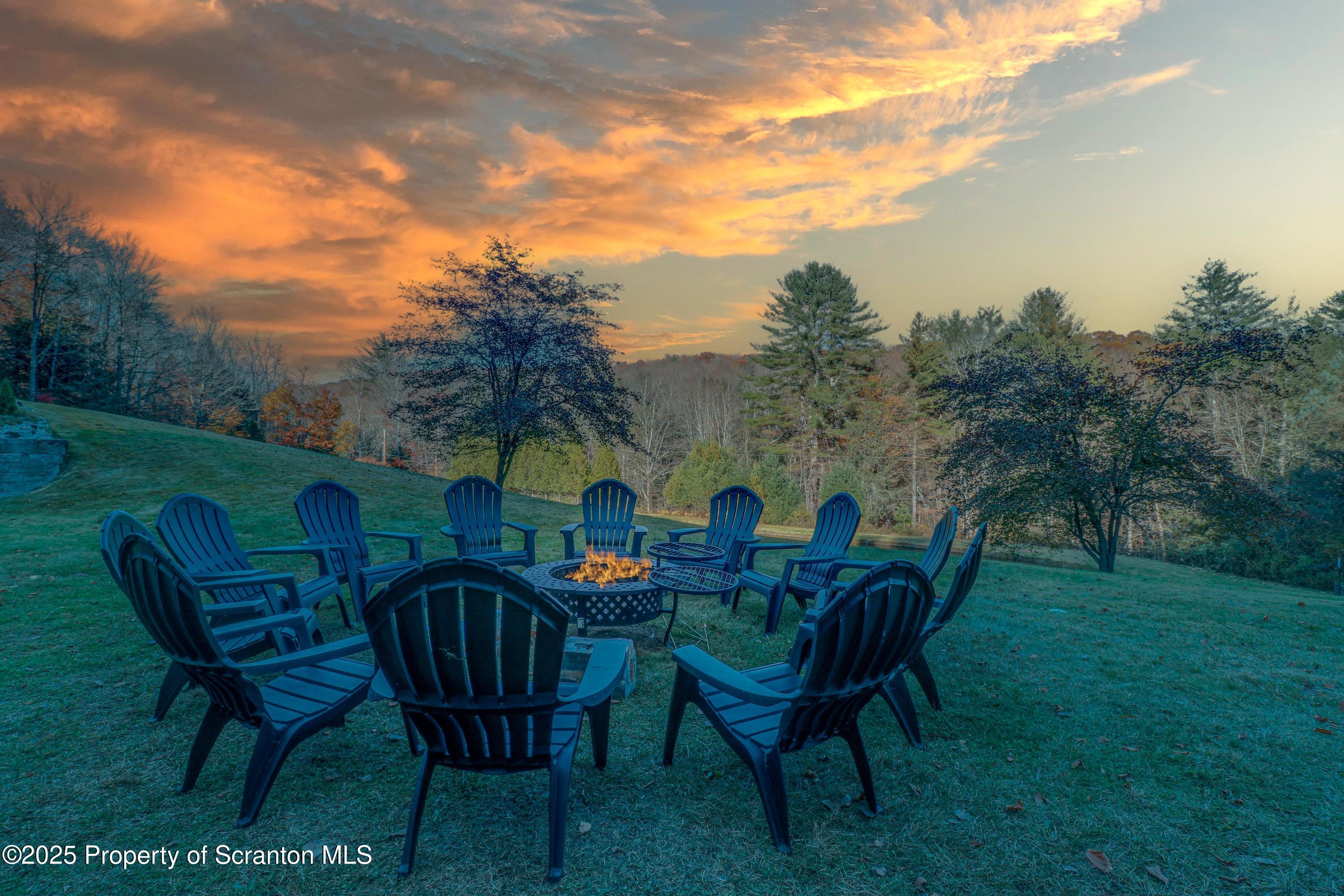 1509 Creek Road New Milford, PA 18834 - Photo 46 of 64 a view of a chairs and table in the patio