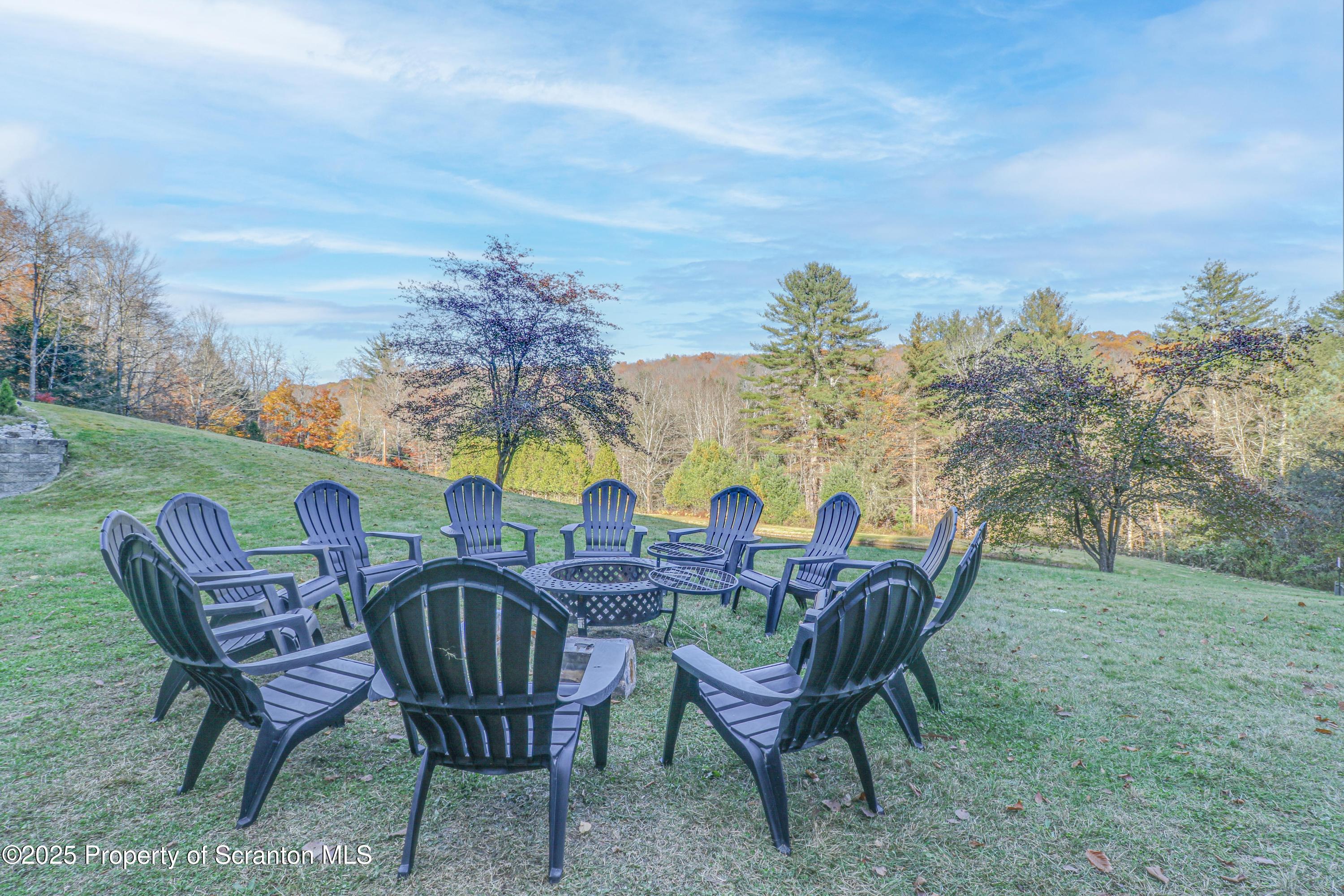 1509 Creek Road New Milford, PA 18834 - Photo 47 of 64 a view of a chairs and table in patio