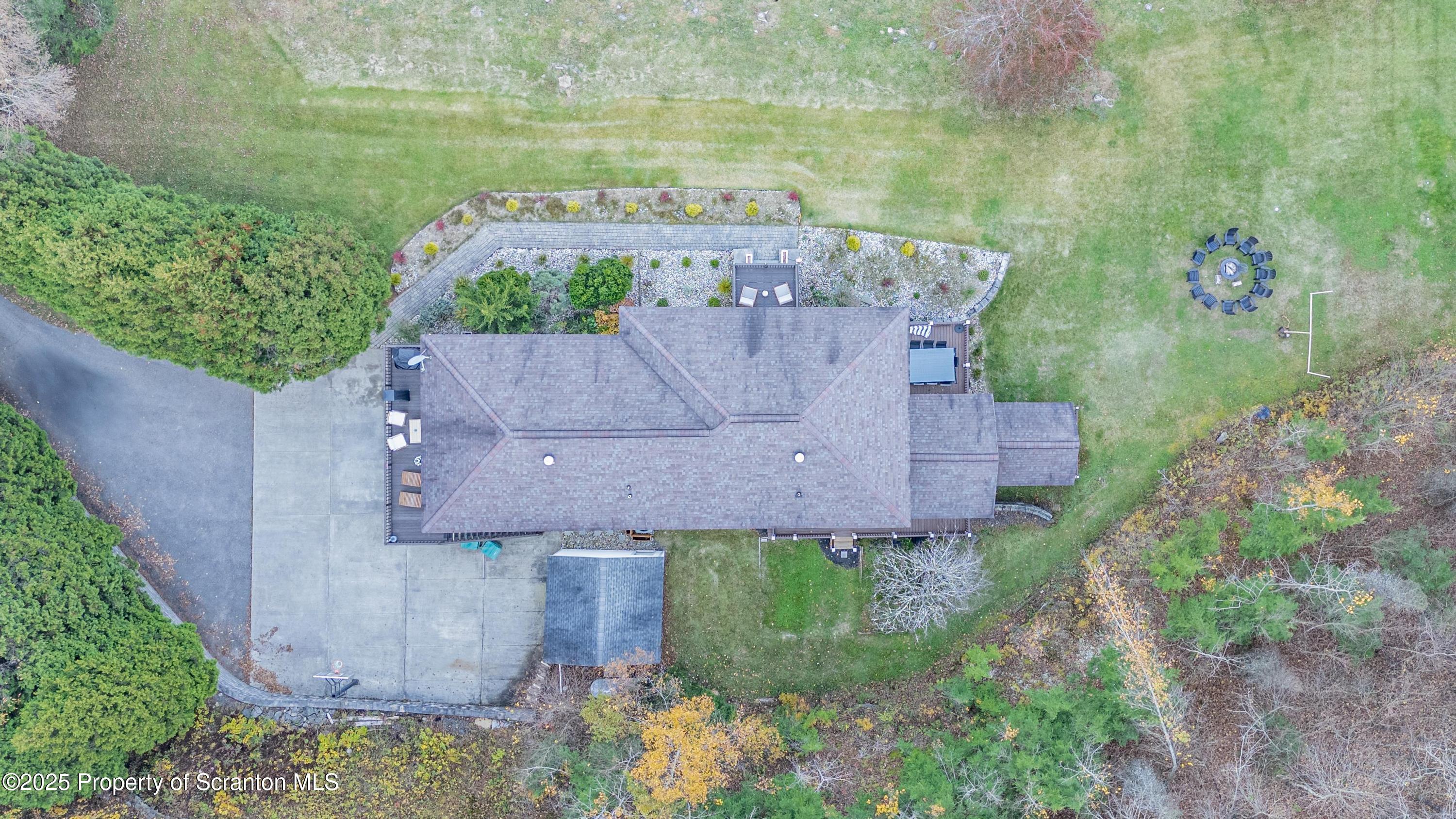 1509 Creek Road New Milford, PA 18834 - Photo 50 of 64 an aerial view of a house with a garden