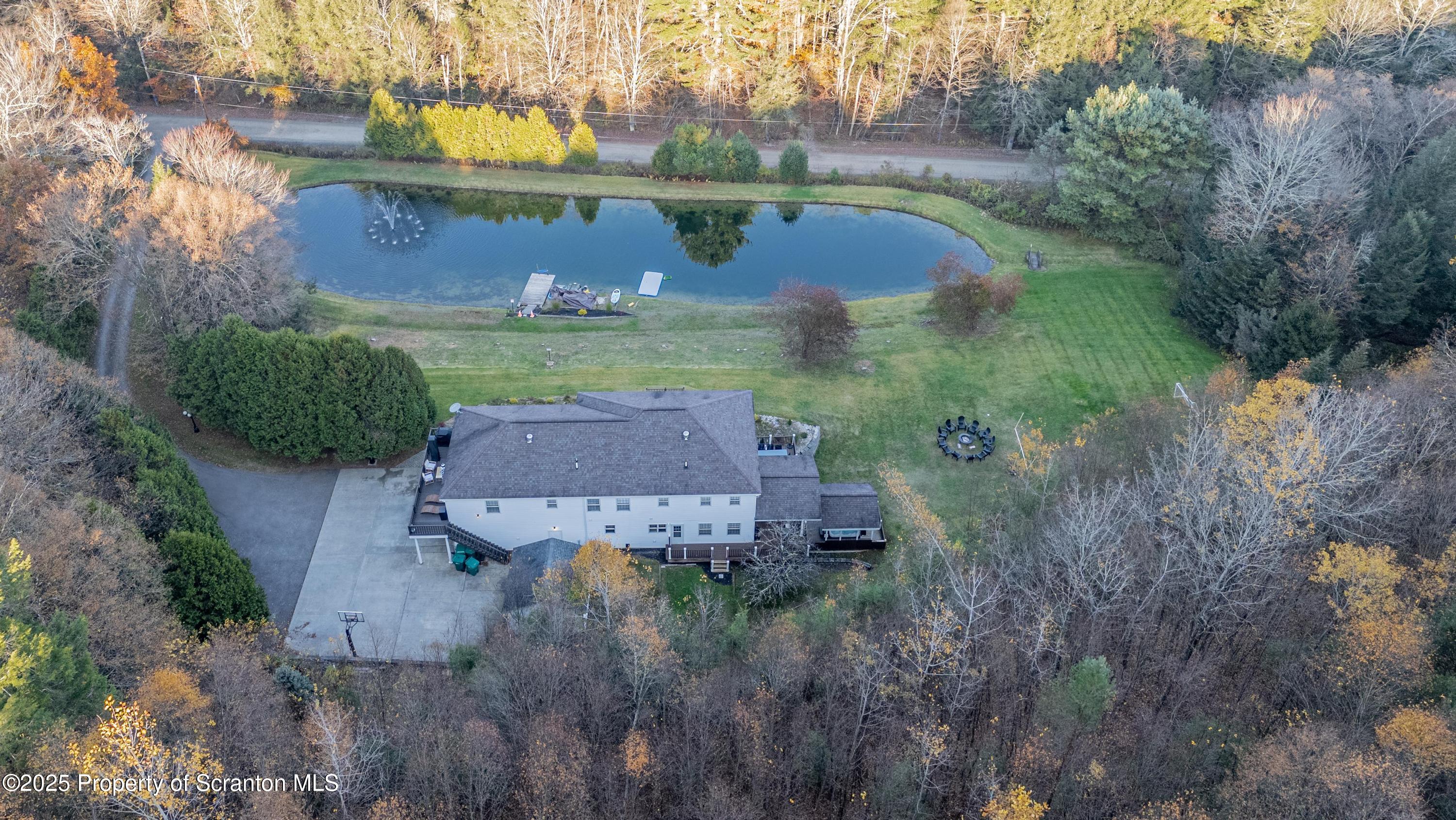 1509 Creek Road New Milford, PA 18834 - Photo 51 of 64 an aerial view of a house with a yard