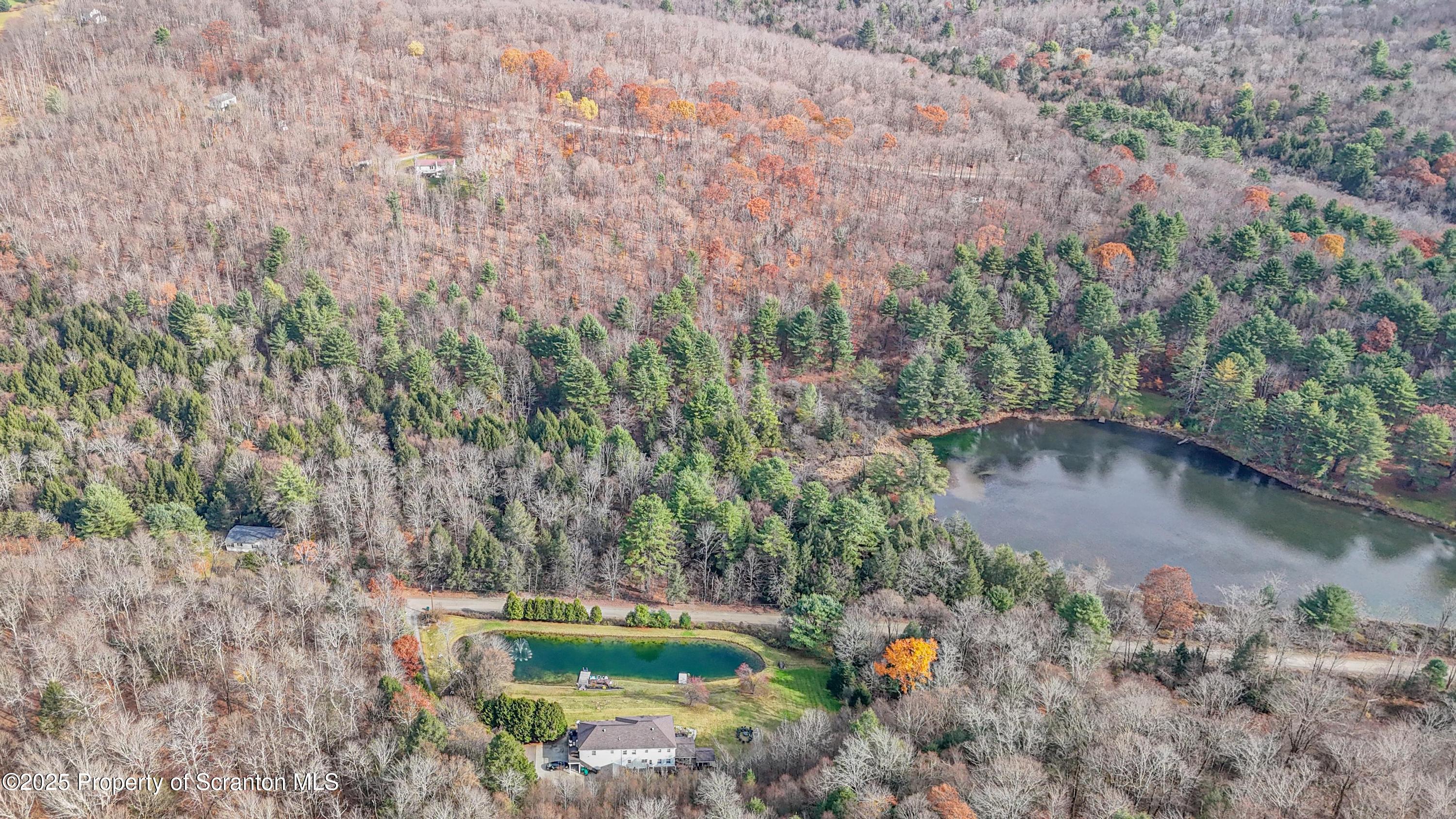 1509 Creek Road New Milford, PA 18834 - Photo 53 of 64 a backyard of a house with a yard and lake view