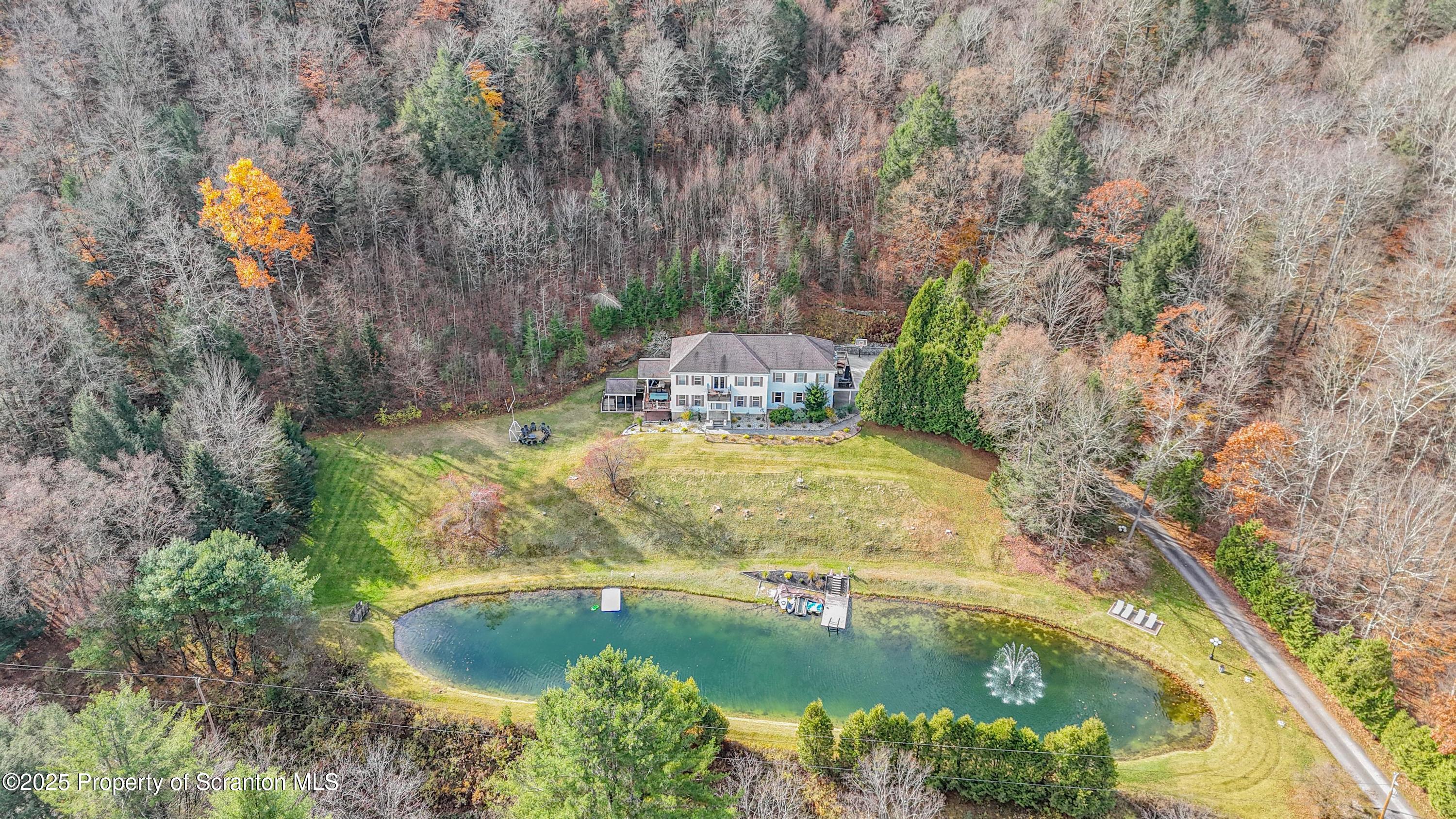 1509 Creek Road New Milford, PA 18834 - Photo 55 of 64 a view of a swimming pool with a yard