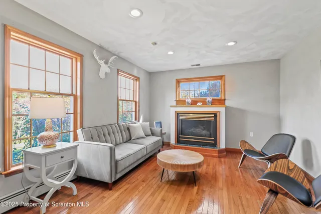 a living room with dining table