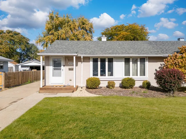 a house view with a garden space