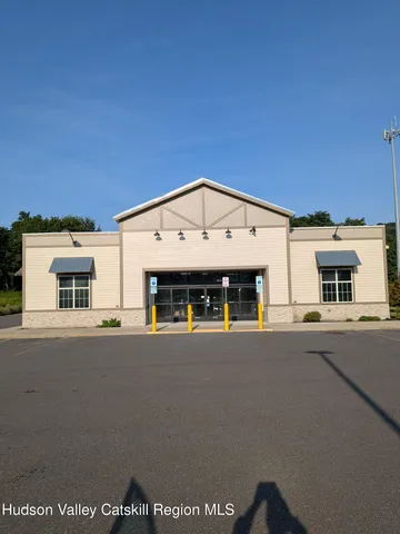 a view of a house with a street