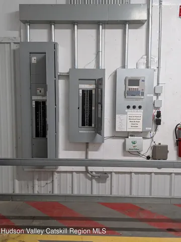 a swimming pool with outdoor seating and yard